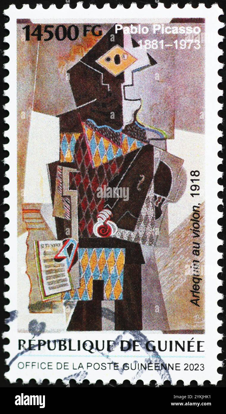 Peinture surréaliste d'Arlequin par Picasso sur timbre-poste Banque D'Images