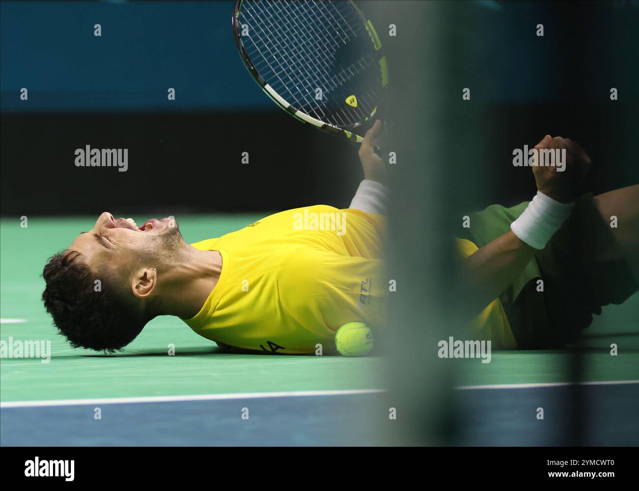 Malaga, Espagne. 21 novembre 2024. Thanasi Kokkinakis d'Australie, célébrant sa victoire contre Ben Shelton des États-Unis lors des quarts de finale de la Coupe Davis 2024 au Palacio de Deportes Jose Maria Martin Carpena Arena à Malaga. Crédit : Isabel Infantes/Alamy Live News Banque D'Images