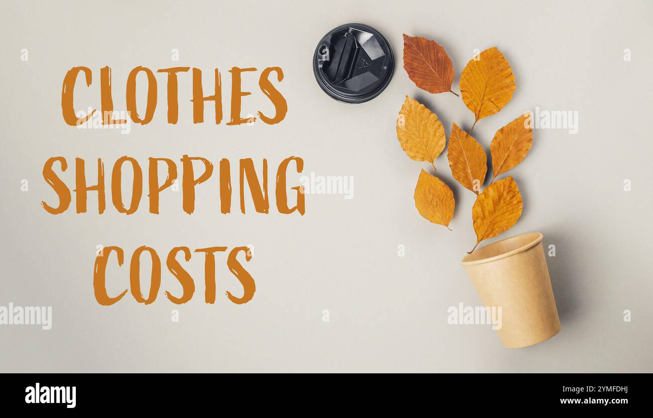 Plante feuillue est sur le dessus d'un fond blanc avec les mots Clothes shopping Costs écrit en dessous Banque D'Images