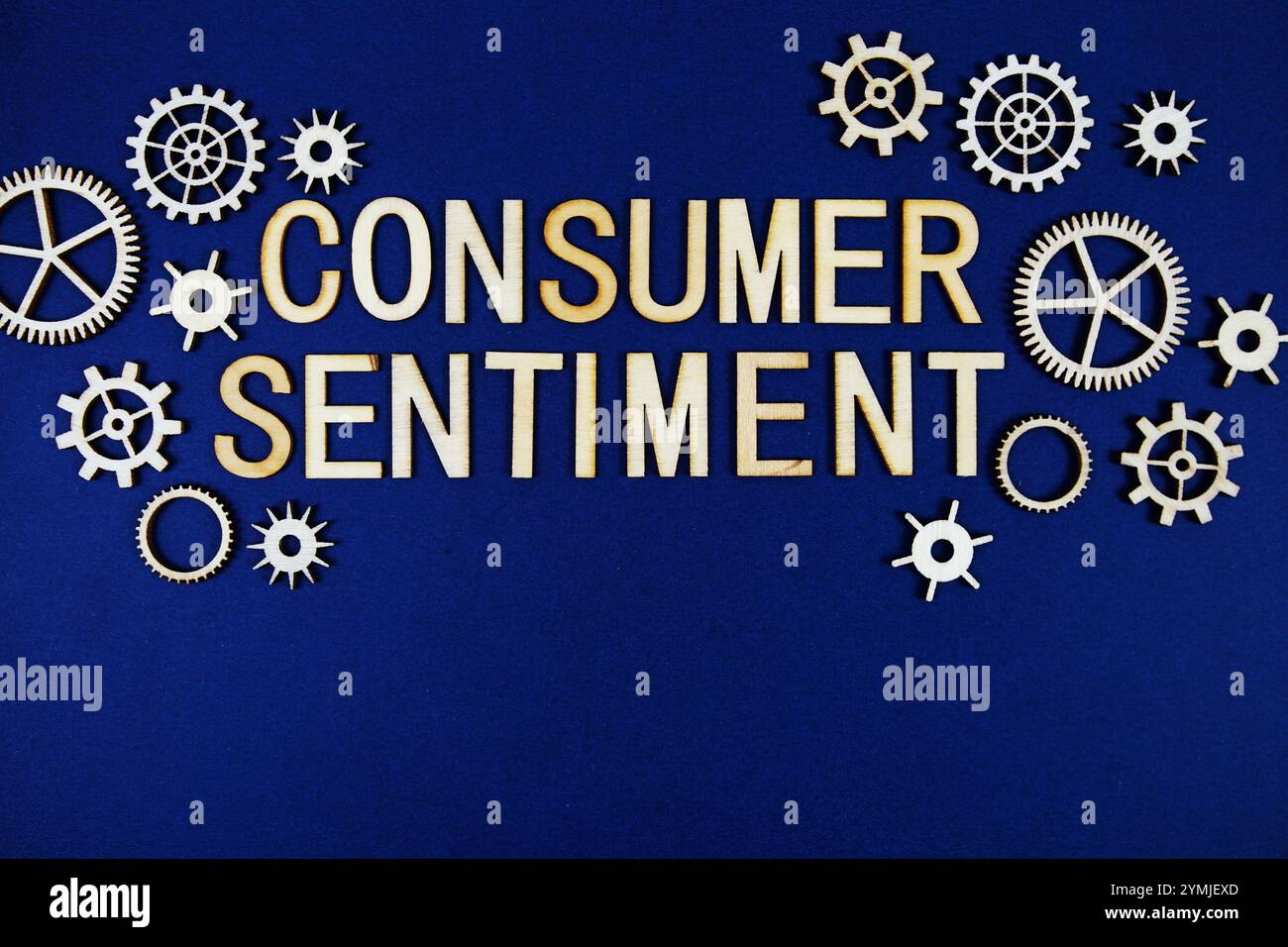 Lettres de l'alphabet du sentiment du consommateur avec élément Gears sur fond bleu marine Banque D'Images