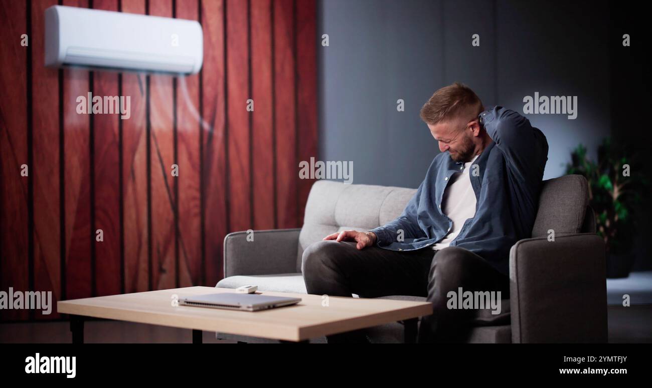 Climatiseur mal de cou problème de douleur dans le salon Banque D'Images