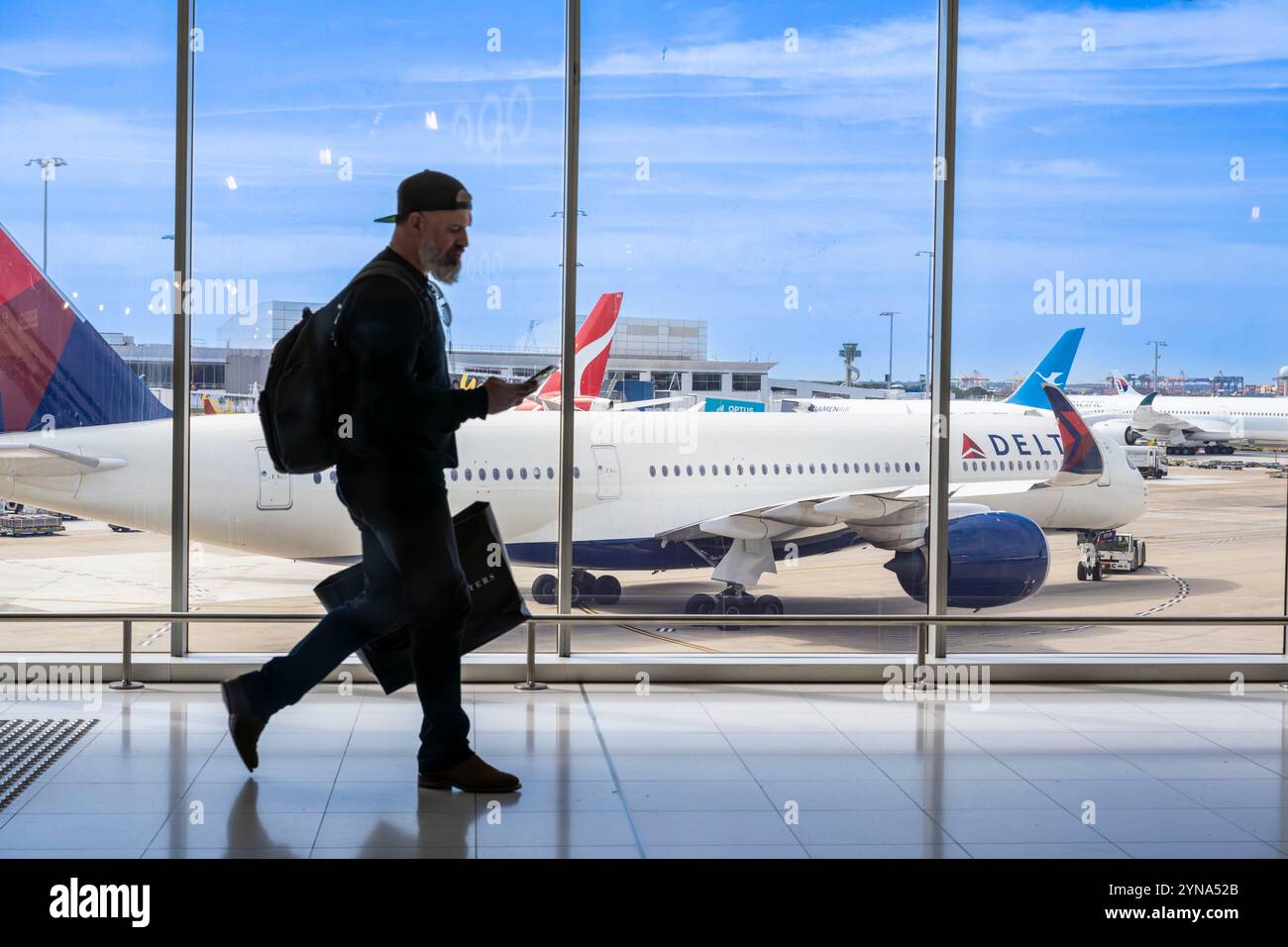 Australie, Nouvelle-Galles du Sud, Sydney, aéroport de Kingsford Smith (SYD), passagers Banque D'Images