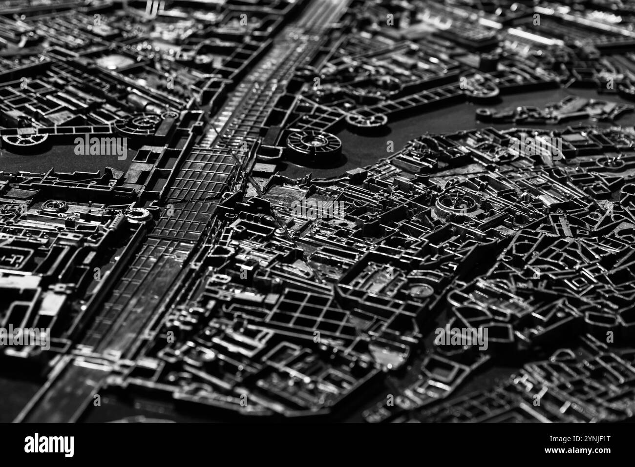 Fond de panneau industriel abstrait, motif de détails en plastique noir chaotique, noir et blanc Banque D'Images
