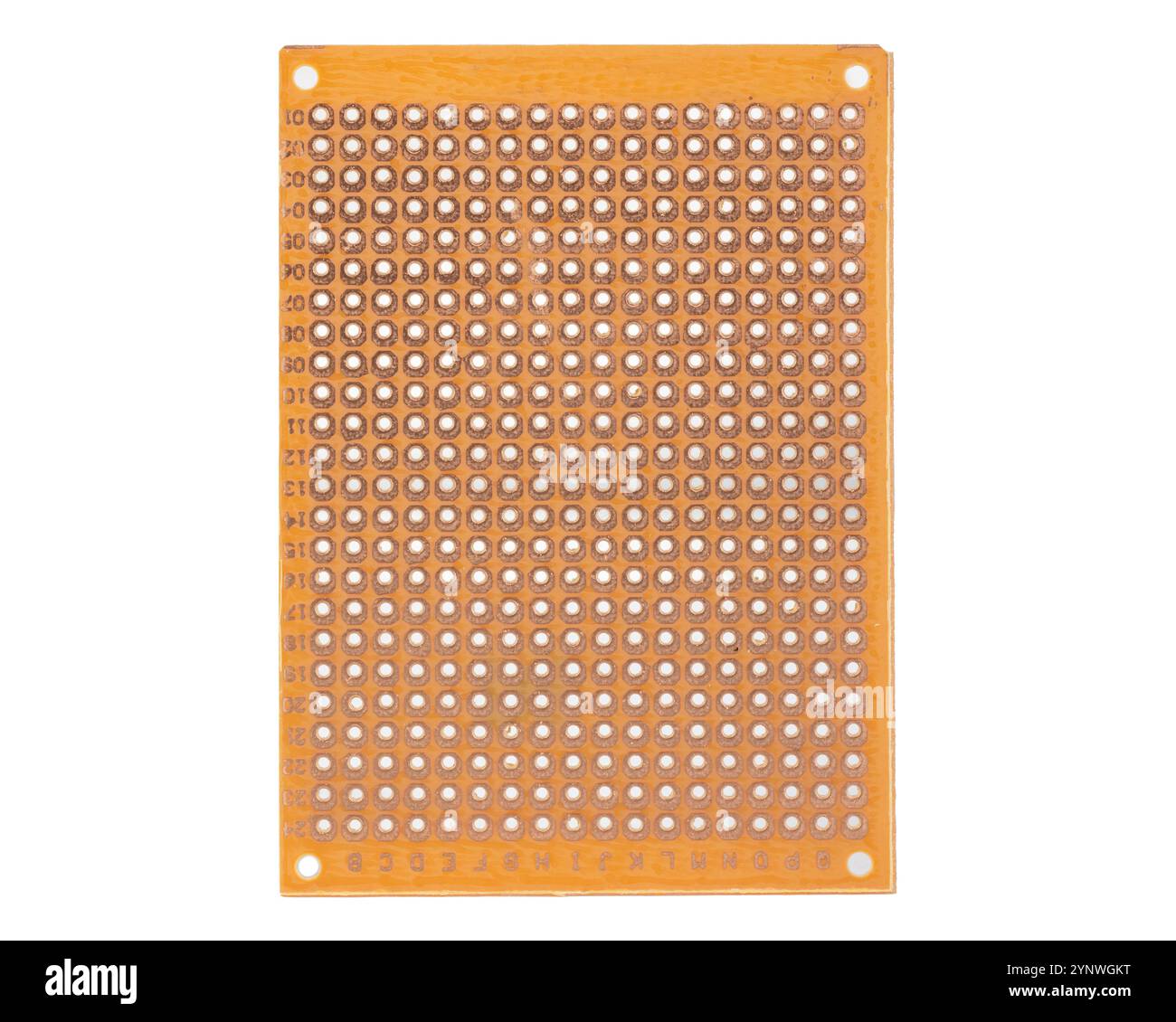 Carte PCB de prototypage orange avec plusieurs trous Banque D'Images