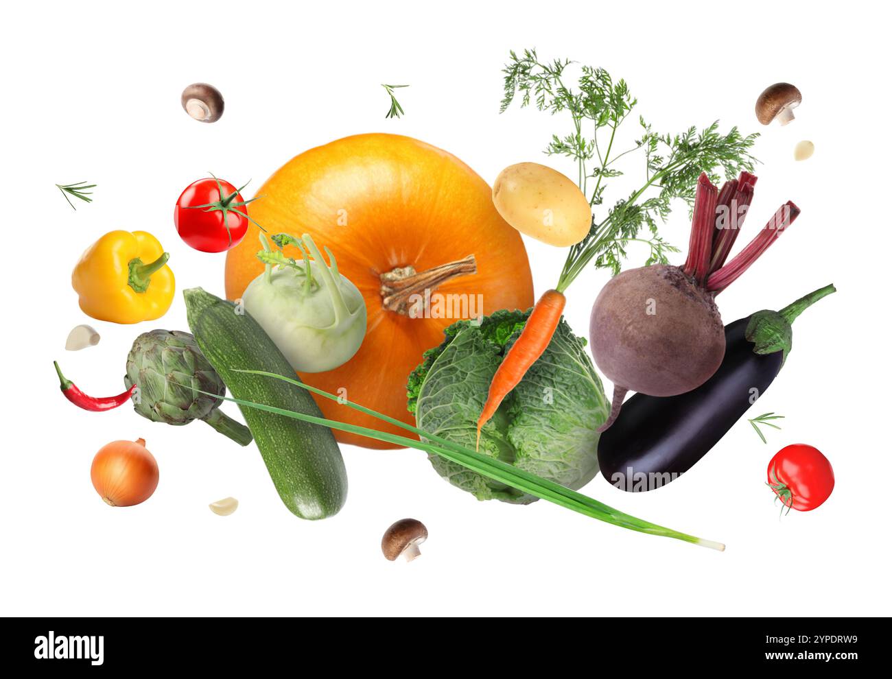 Différents légumes frais dans l'air sur fond blanc Banque D'Images