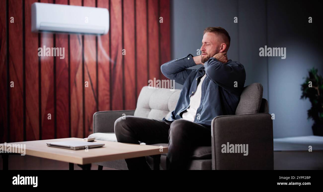 Climatiseur mal de cou problème de douleur dans le salon Banque D'Images