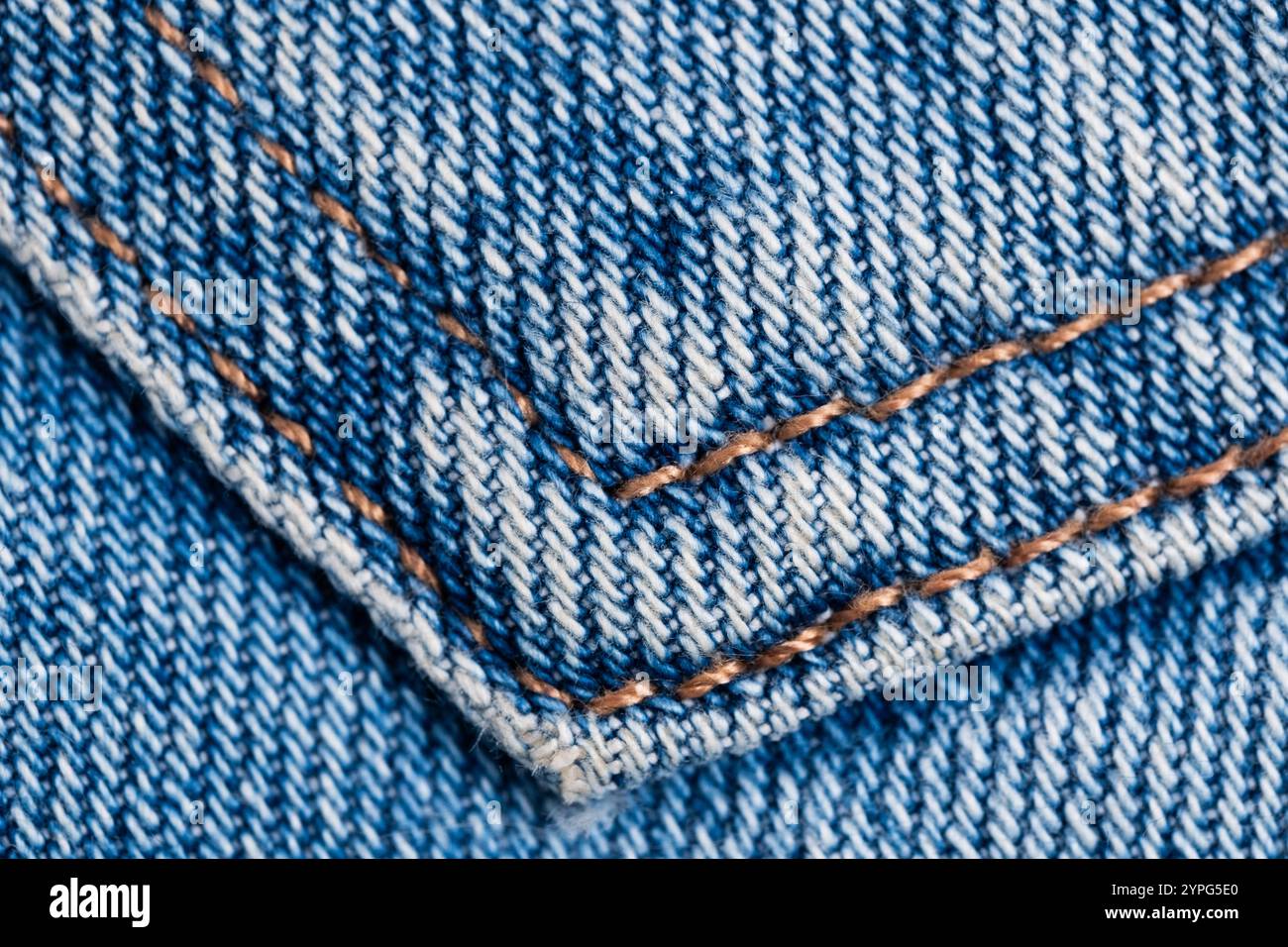 Texture jeans. Gros plan de tissu Jean bleu avec couture Banque D'Images