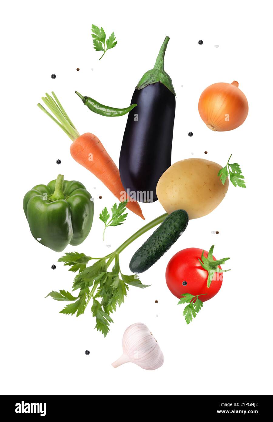 Différents légumes frais dans l'air sur fond blanc Banque D'Images