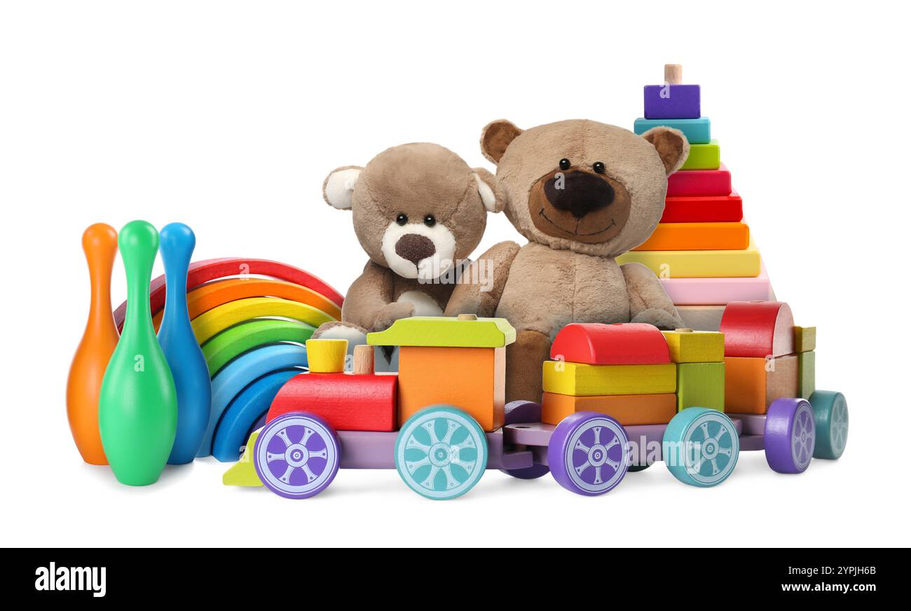Ours en peluche et autres jouets isolés sur blanc Banque D'Images