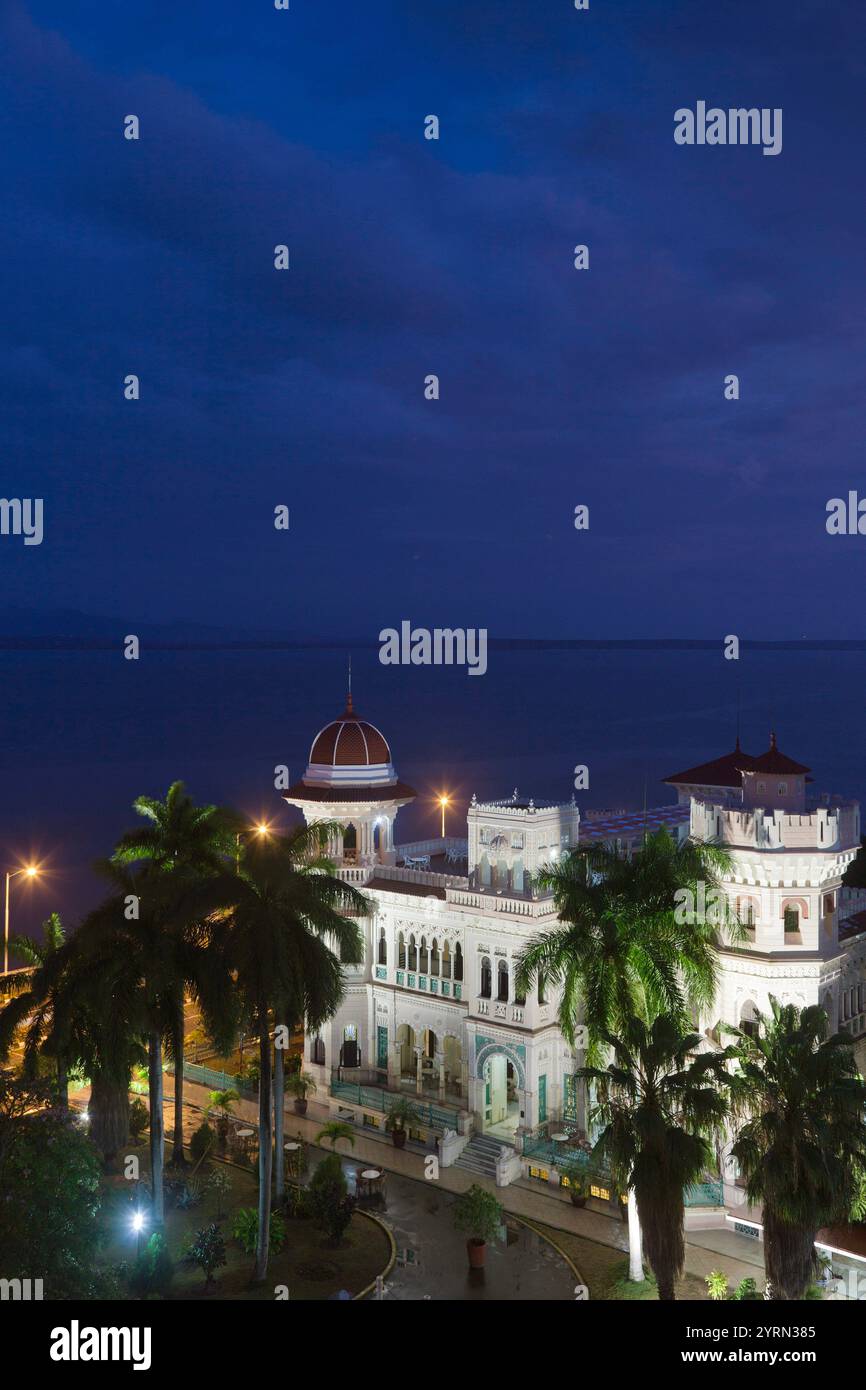 Cuba, Cienfuegos, Cienfuegos Province, Punta Gorda, Palacio de Valle, ancien hôtel particulier du baron de sucre, elevated view, dusk Banque D'Images