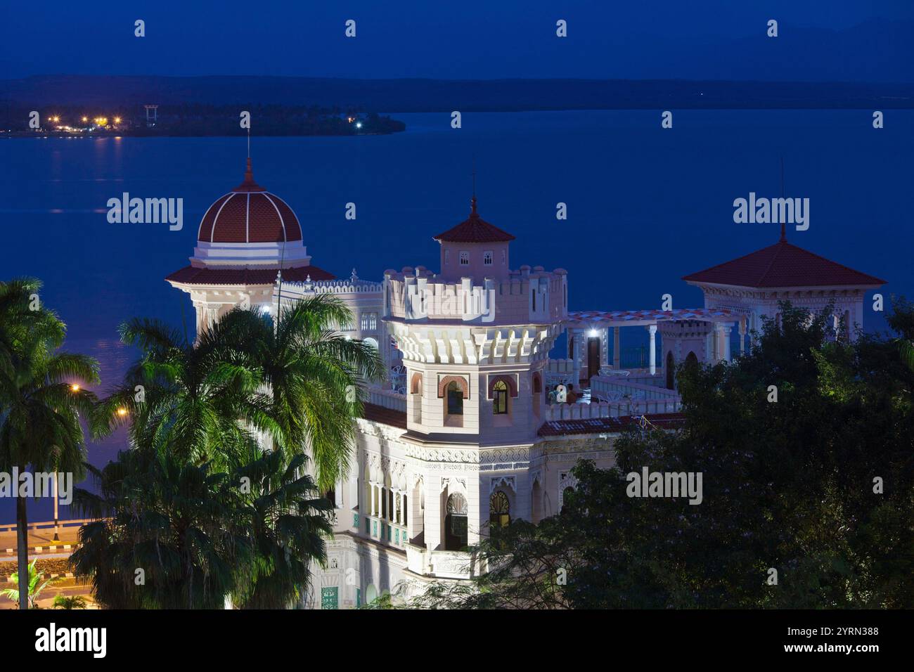 Cuba, Cienfuegos, Cienfuegos Province, Punta Gorda, Palacio de Valle, ancien hôtel particulier du baron de sucre, elevated view, dusk Banque D'Images