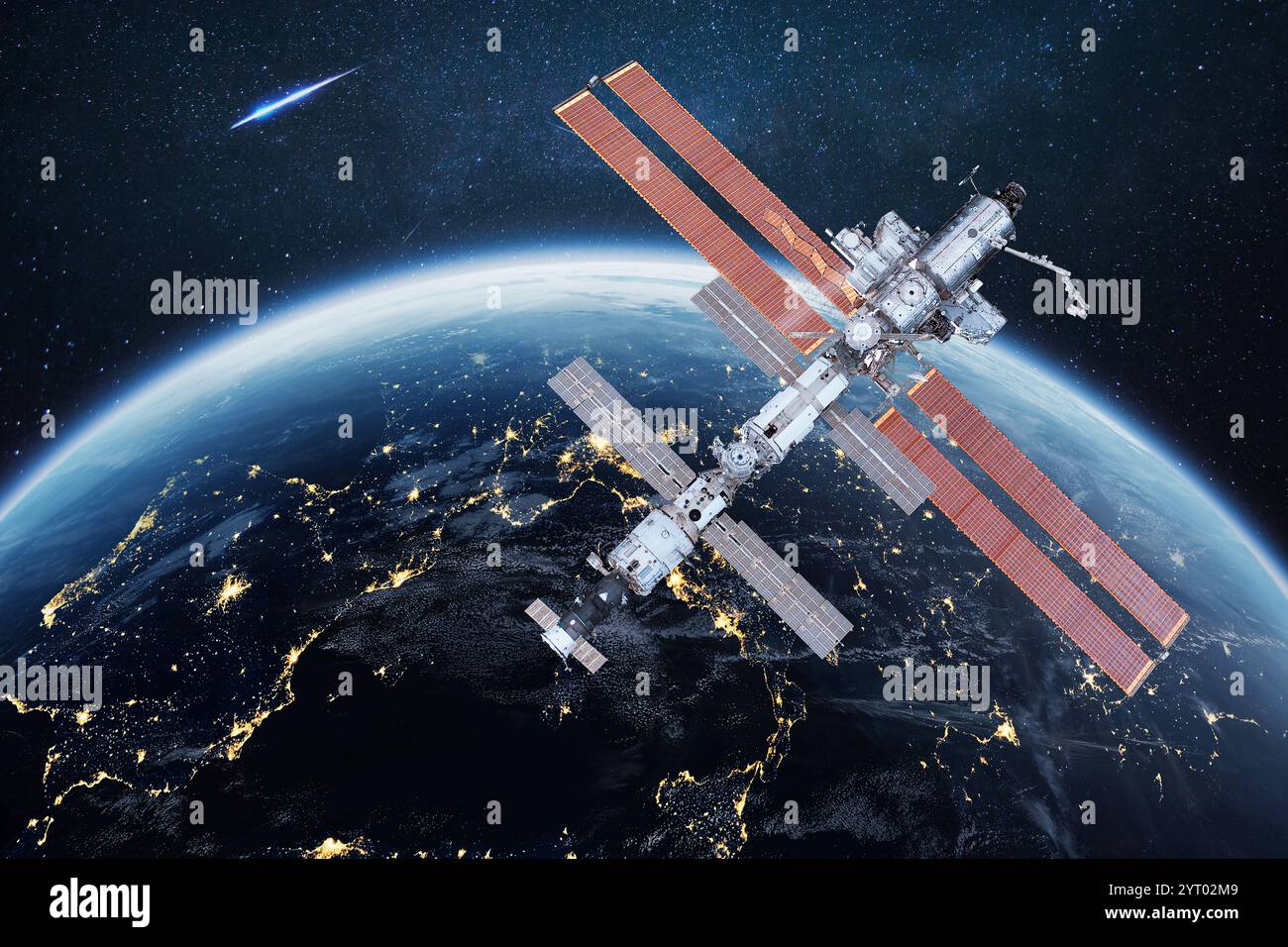 L'ISS vole près de la planète Terre de nuit bleue. Mission spatiale et exploration spatiale. Communications et technologies en orbite terrestre Banque D'Images