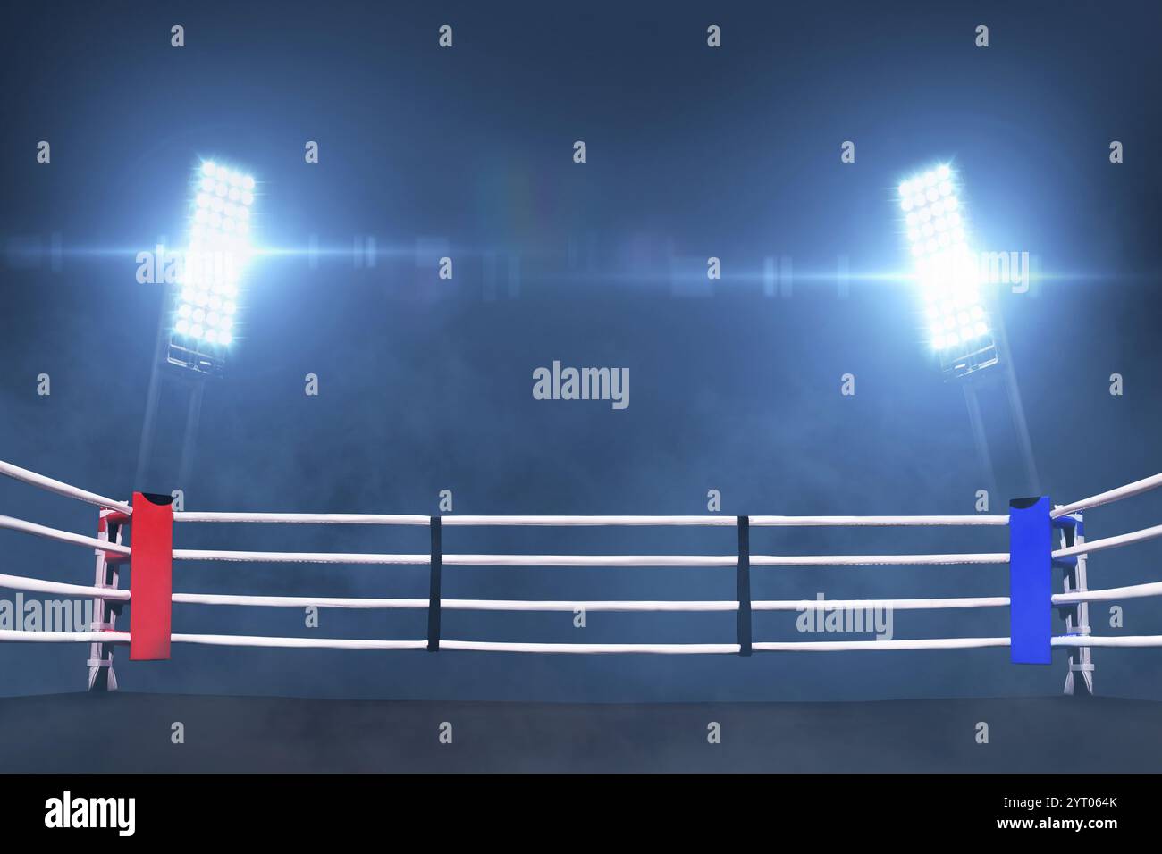 Anneau de boxe avec des cordes dans un stade avec des projecteurs de lumière bleue. Nuit des Champions et combat. Bataille pour le championnat Banque D'Images