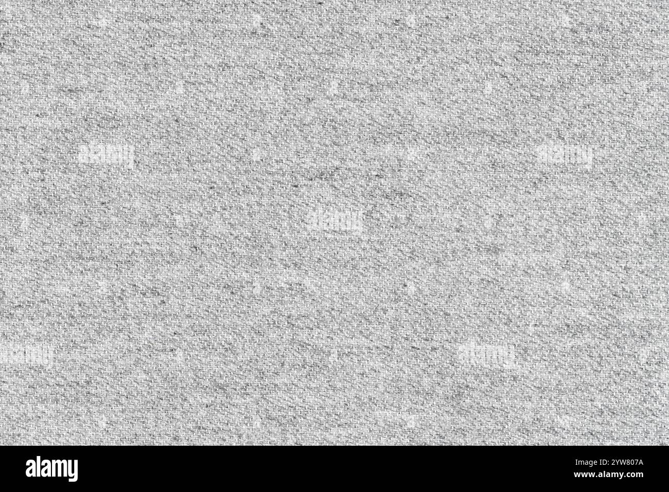 Motif de tissu abstrait tissé à la main de couleur grise pour le fond. Photo en gros plan d'un matériau textile gris clair au niveau de la surface, fond coloré tex Banque D'Images