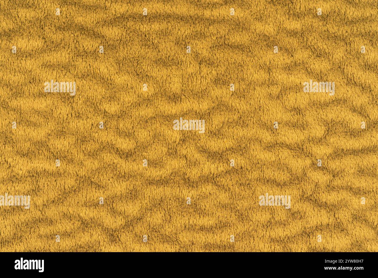 Velours jaune ou velours avec un fond de texture moelleux et doux à poil court. Vue de dessus de macro-photographie de détail en gros plan du matériau en tissu de couleur jaune, Banque D'Images