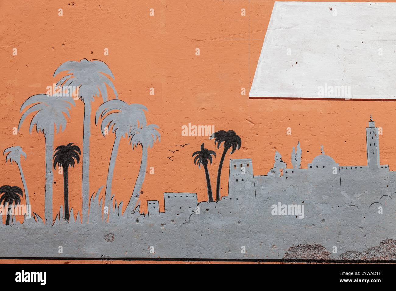 Représentation de l'horizon de la ville de Marrakech sur un mur de la médina Banque D'Images