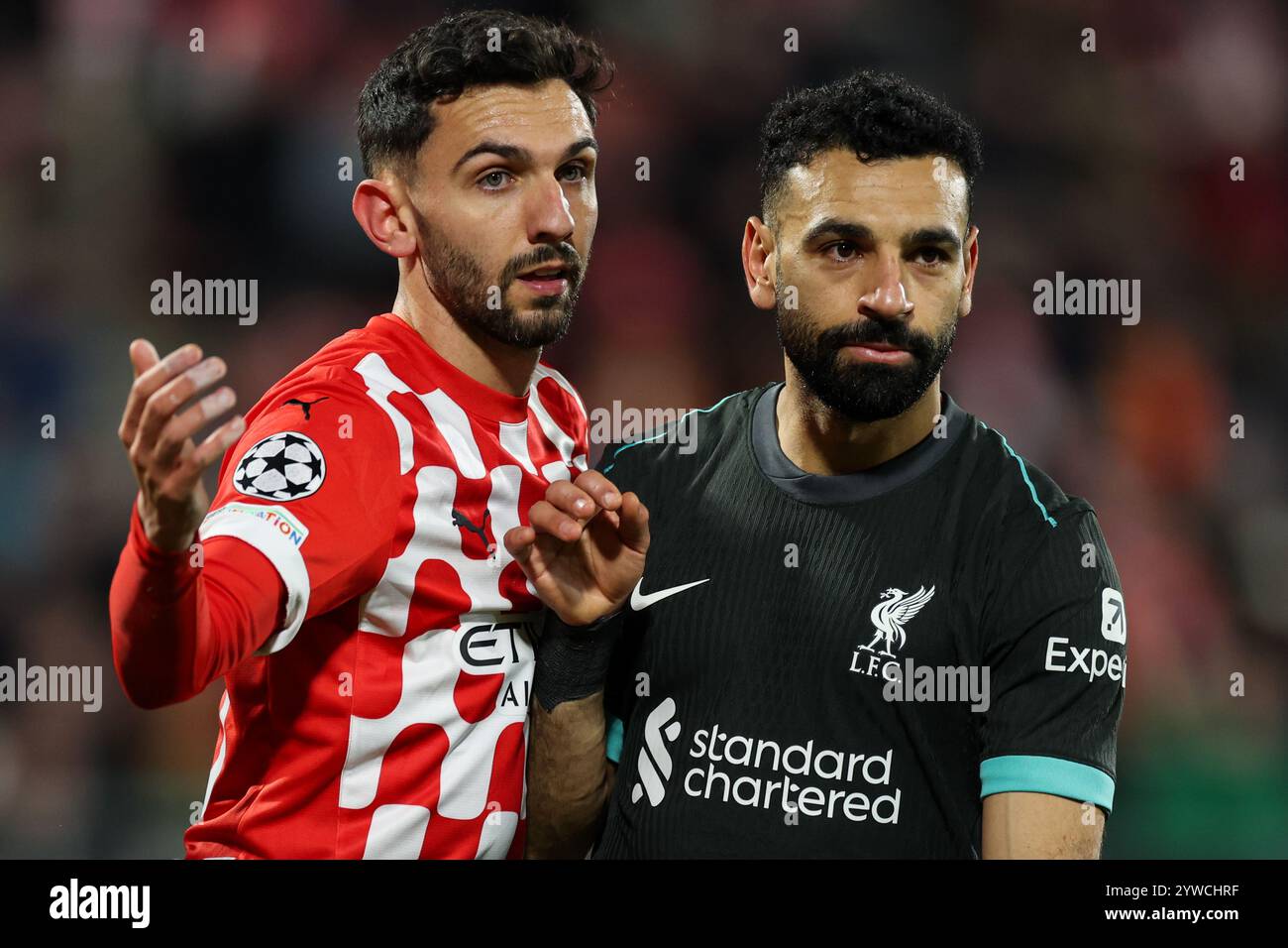 Gérone, Espagne. 10 décembre 2024. Gérone, Espagne, 22 octobre 2024 : Ivan Martin Nuñez (23 Girona FC) et Mohamed Salah Hamed Mahrous Ghaly (11 Liverpool FC) en action lors du match de football de l'UEFA Champions League entre Girona FC et Liverpool FC au stade Montilivi de Gérone, Espagne (Judit Cartiel/SPP) crédit : SPP Sport Press photo. /Alamy Live News Banque D'Images