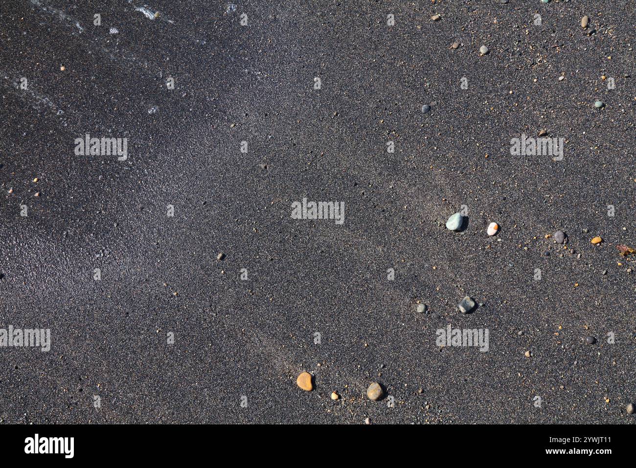 Fond noir de sable volcanique de la plage d'Ajuy dans l'île de Fuerteventura des îles Canaries, Espagne. Banque D'Images