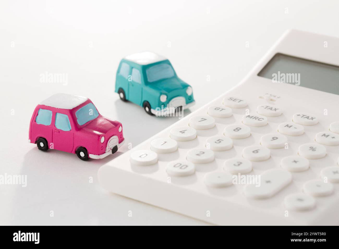 Voiture miniature et calculatrice Banque D'Images