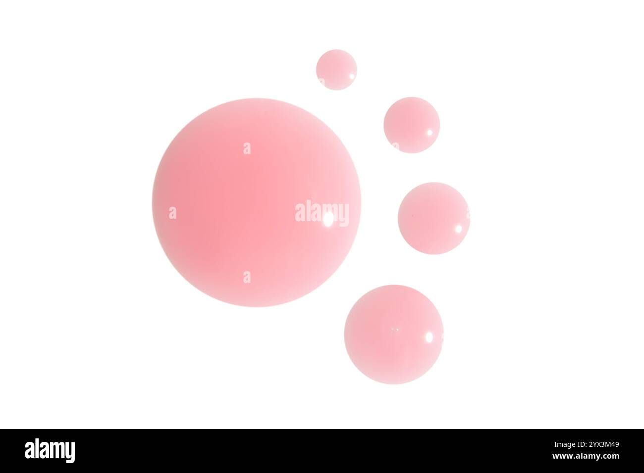 Gouttes de crème rose ou de gel sur un fond vide. Produit de soin de la peau, soins de beauté. Banque D'Images