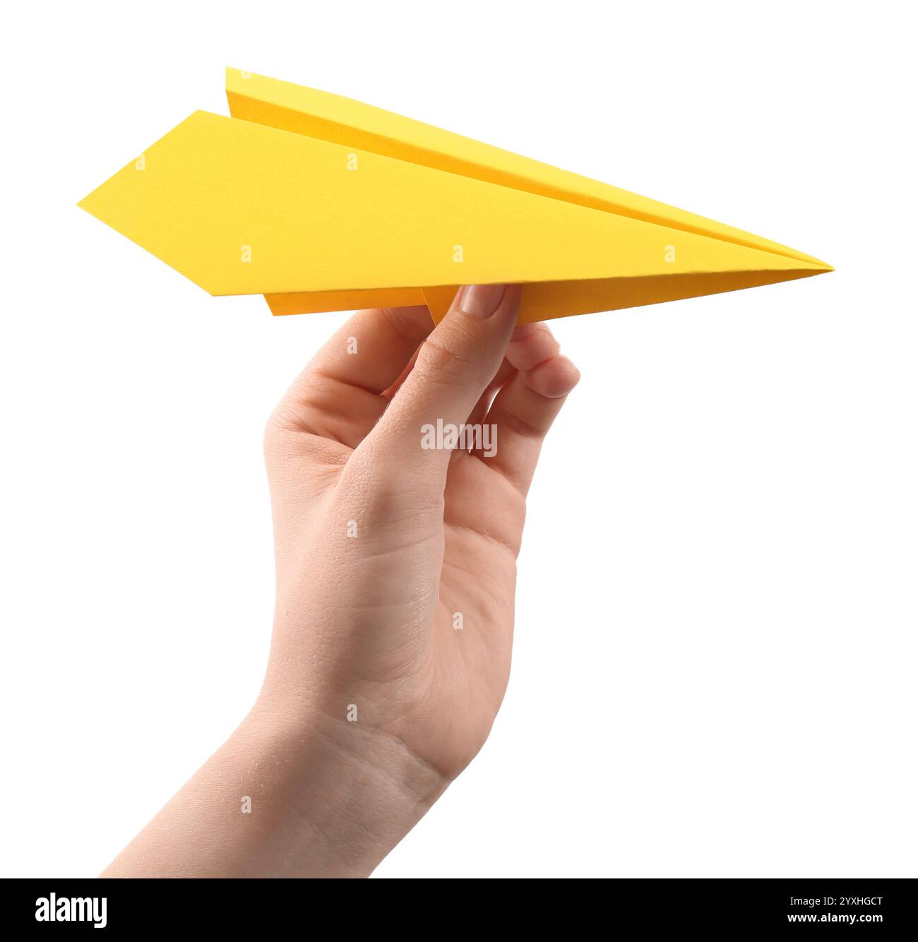 Femme avec un avion de papier jaune sur fond blanc, gros plan Banque D'Images Femme avec un avion de papier jaune sur fond blanc, gros plan Banque D'Images