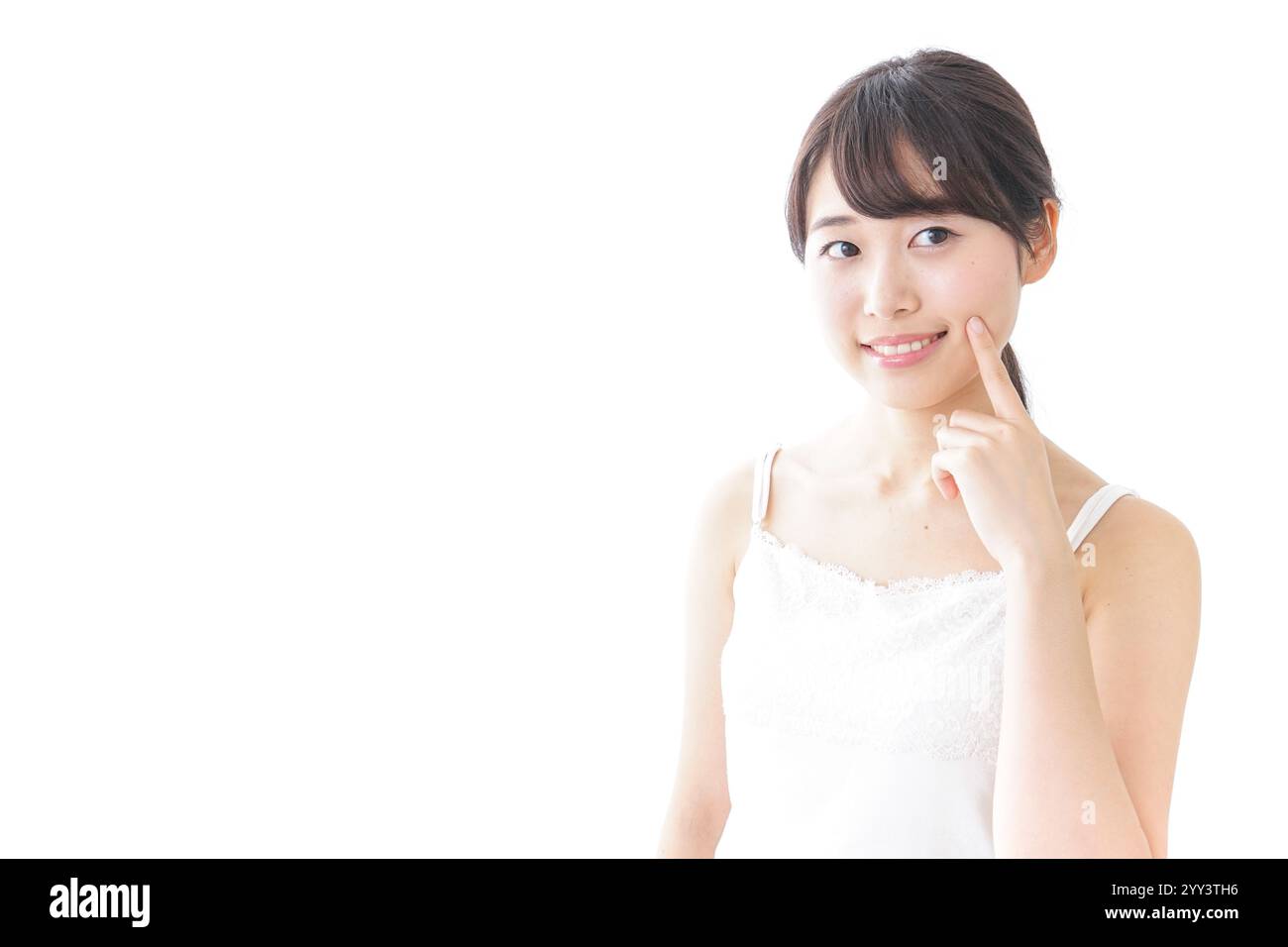 Jeune femme prenant soin de la peau Banque D'Images