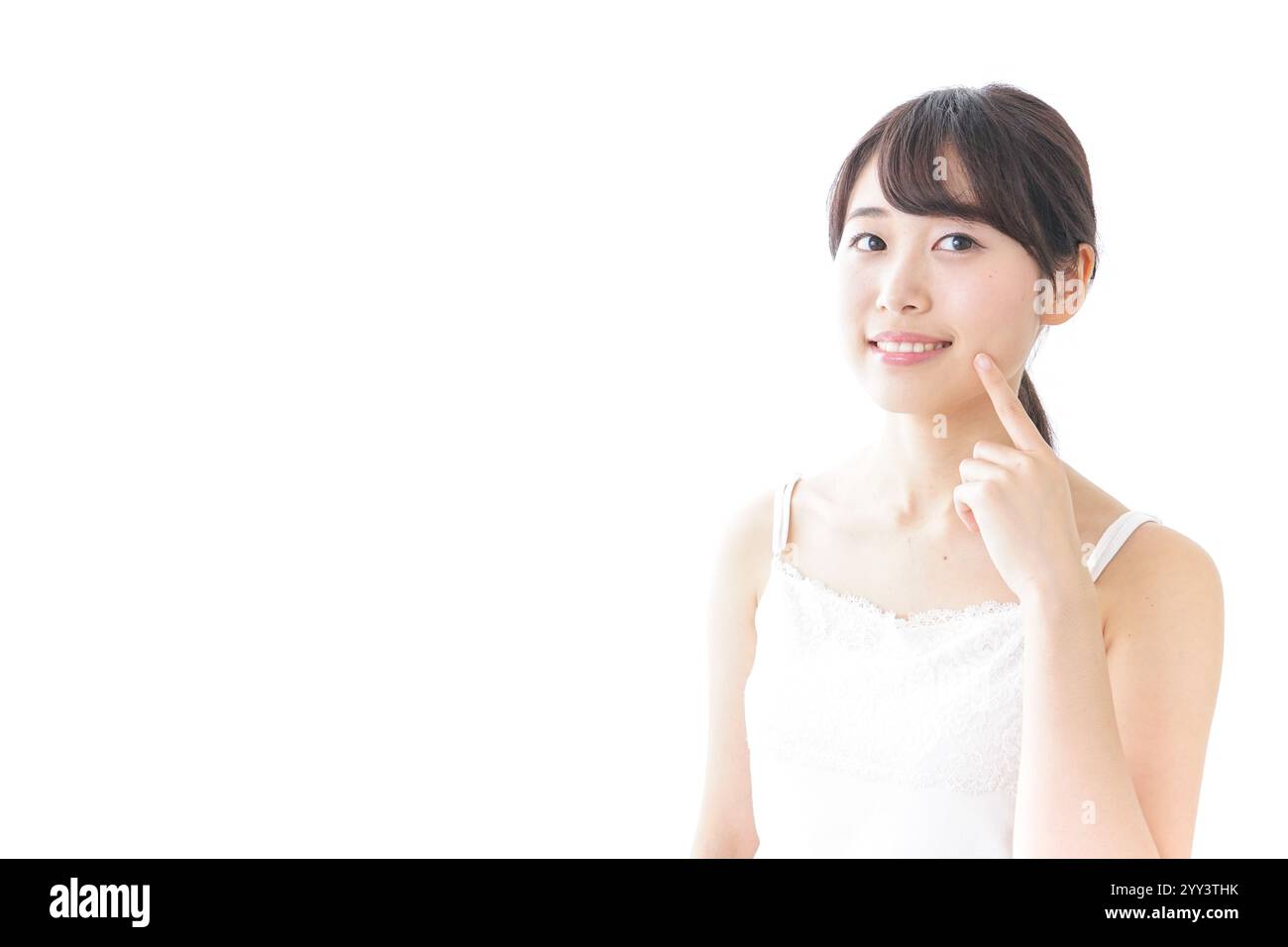 Jeune femme prenant soin de la peau Banque D'Images