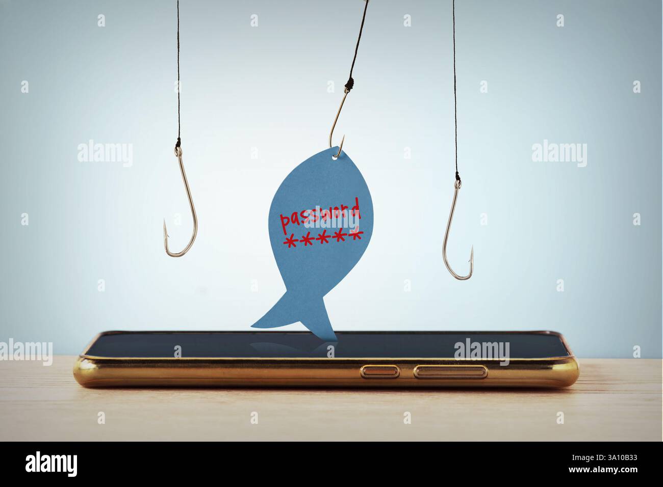 Téléphone portable et hameçons de pêche avec note papier en forme de poisson avec le mot de passe écrit - phishing, vol de données et concept de sécurité Internet Banque D'Images