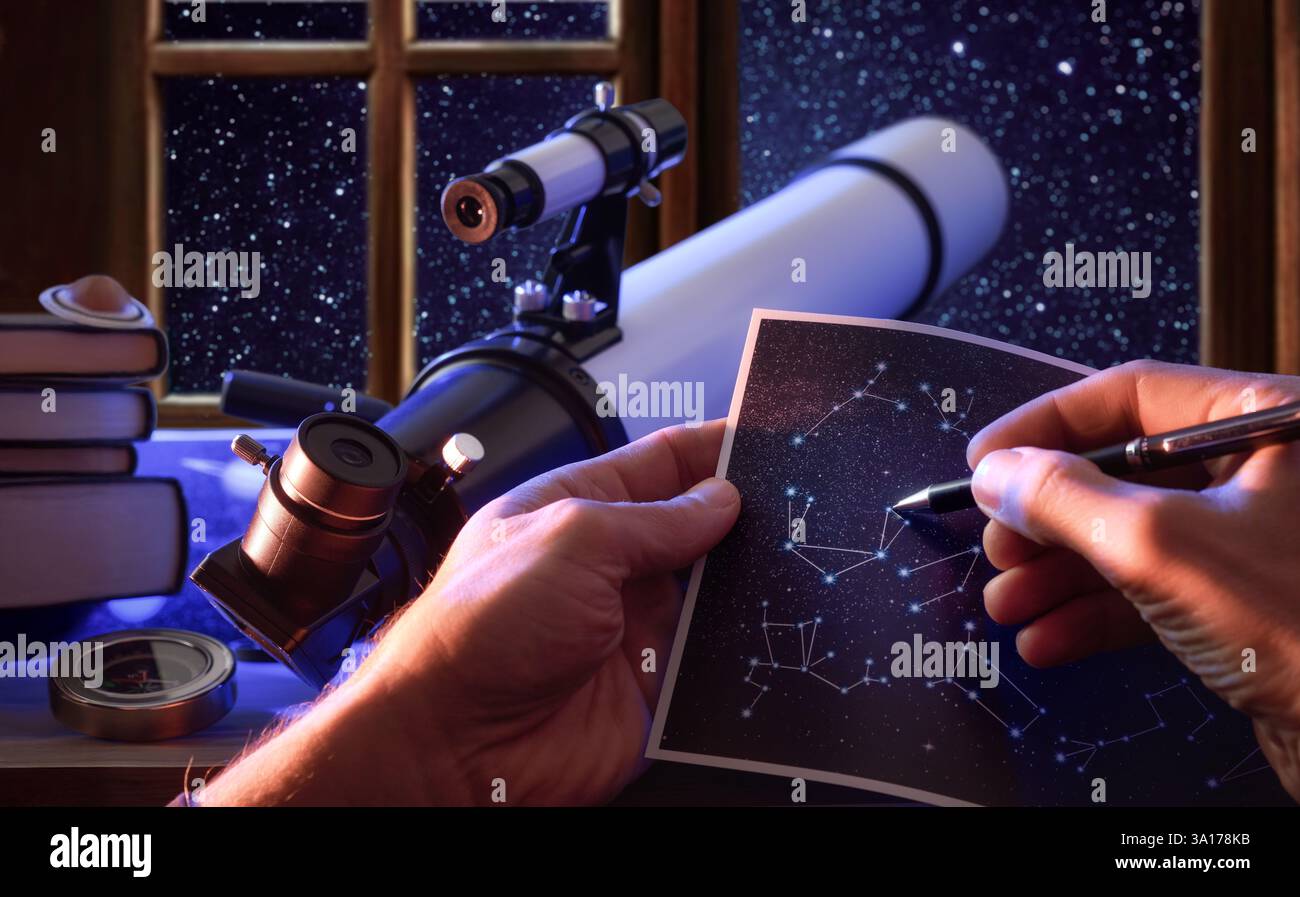 Personne qui étudie les constellations stellaires avec une carte en main pointant vers une étoile dans une pièce avec une table avec un télescope se concentrant sur le ciel et les livres Front Banque D'Images