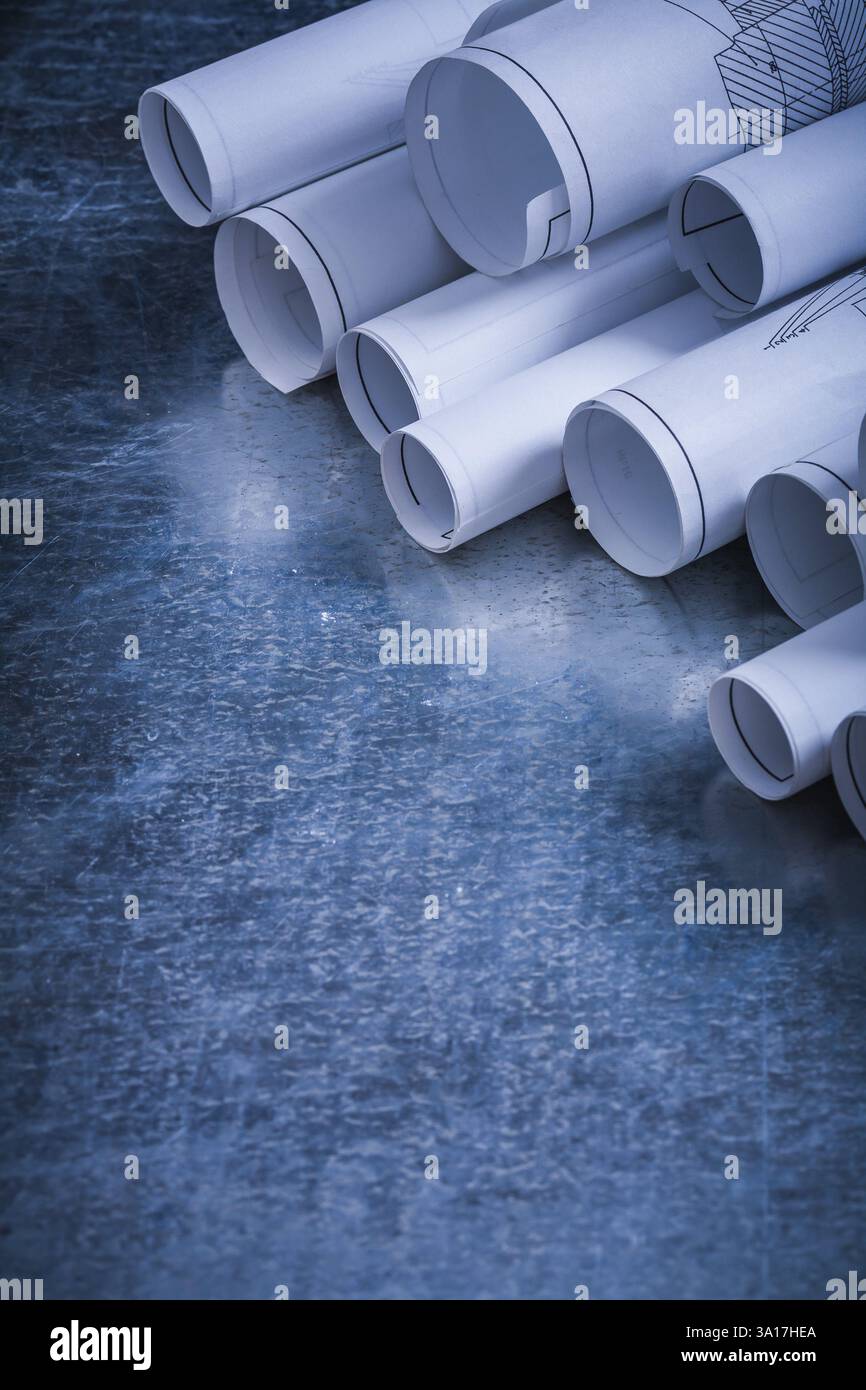 Gros plan sur les plans de construction sur le bâtiment de surface argentée vintage rayé et le concept d'architecture Banque D'Images