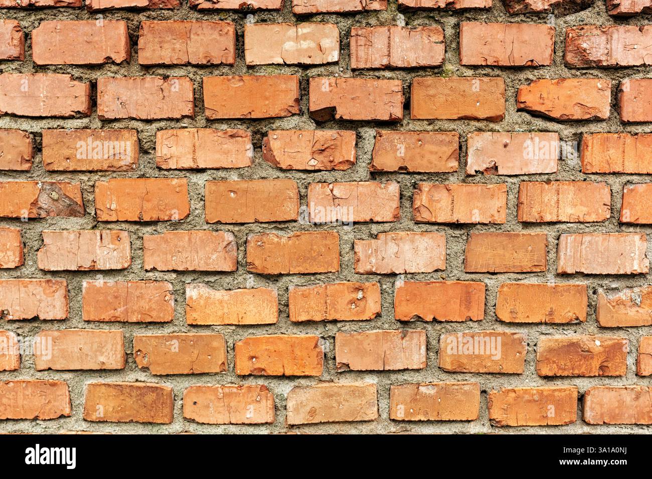 Mur de brique rouge Old Weathered Texture Background. Abstract Grunge Stone Pattern, âgés de mur rouge avec de petites fissures. Banque D'Images