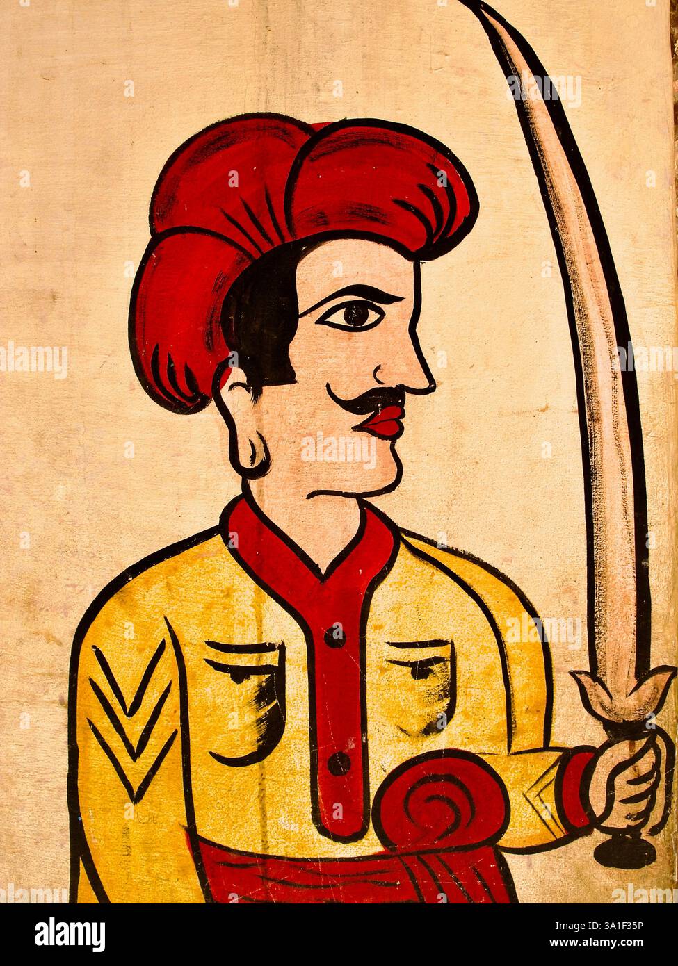 Murale décolorée d'un guerrier Rajasthani avec un turban et une épée sur un mur altéré à Varanasi, en Inde, évoquant l'histoire et le patrimoine. Banque D'Images