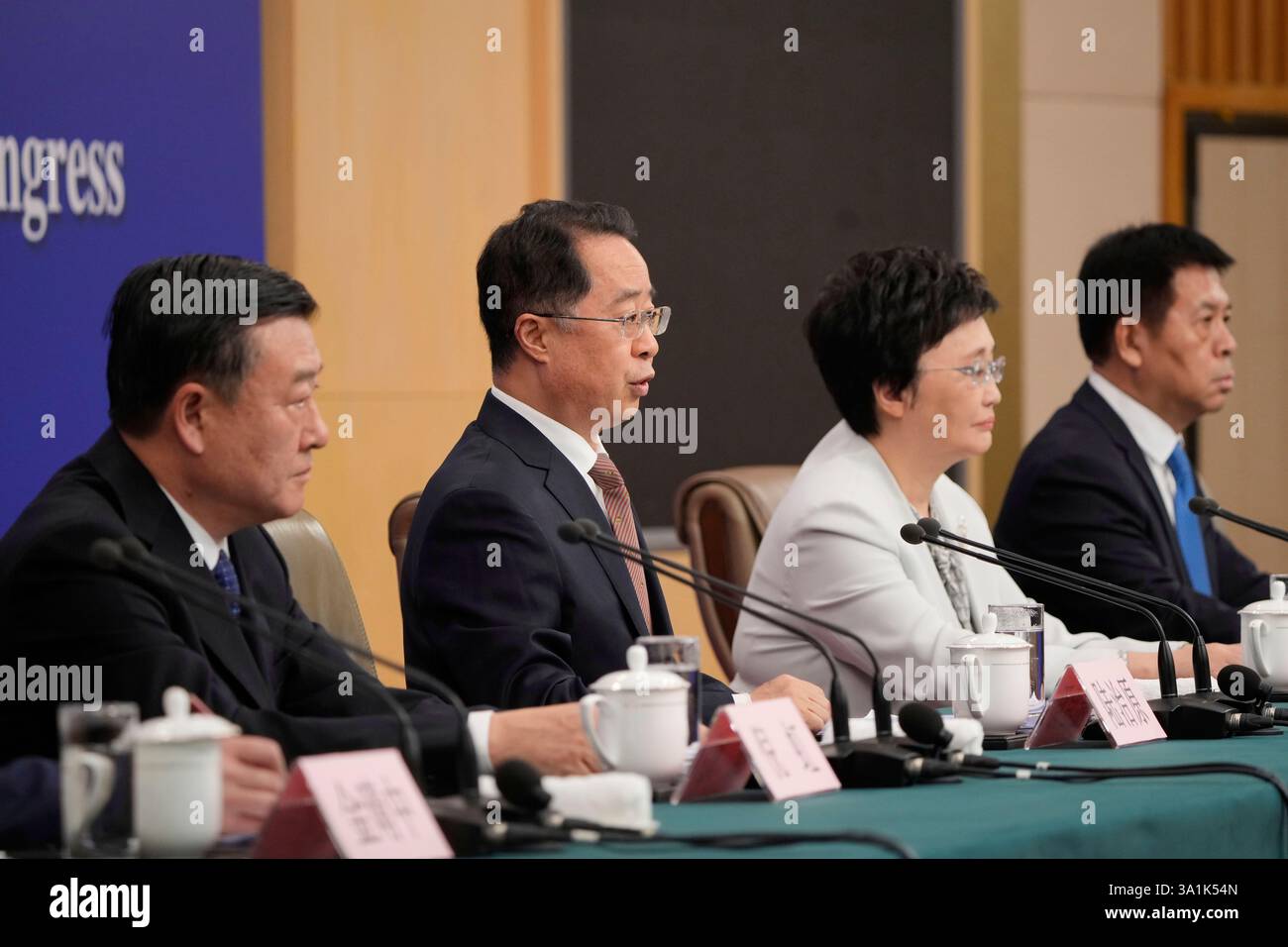 From left to right, Ni Hong, minister of Housing and Urban-Rural Development, Lu Zhiyuan, minister of Civil Affairs, Wang Xiaoping, minister of Human Resources and Social Security and Lei Haichao, minister of the National Health Commission, attend a press conference for the second session on the sideline of the National People's Congress in Beijing, China, Sunday, March 9, 2025. (AP Photo/Vincent Thian) Banque D'Images