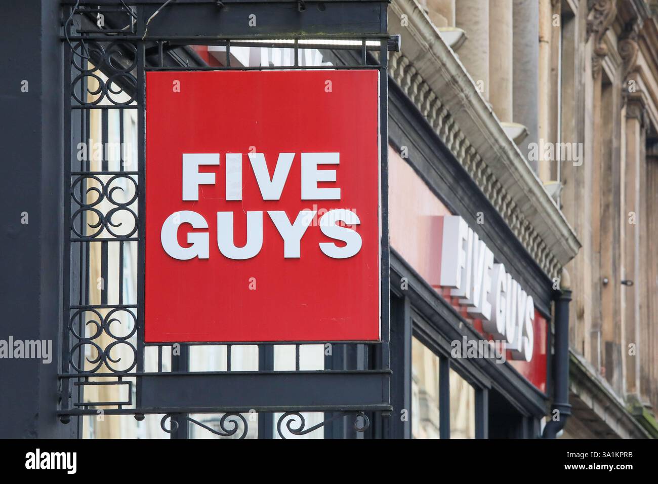 Signe de copyright devant le restaurant de restauration rapide Five Guys, Glasgow, Écosse, Royaume-Uni Banque D'Images
