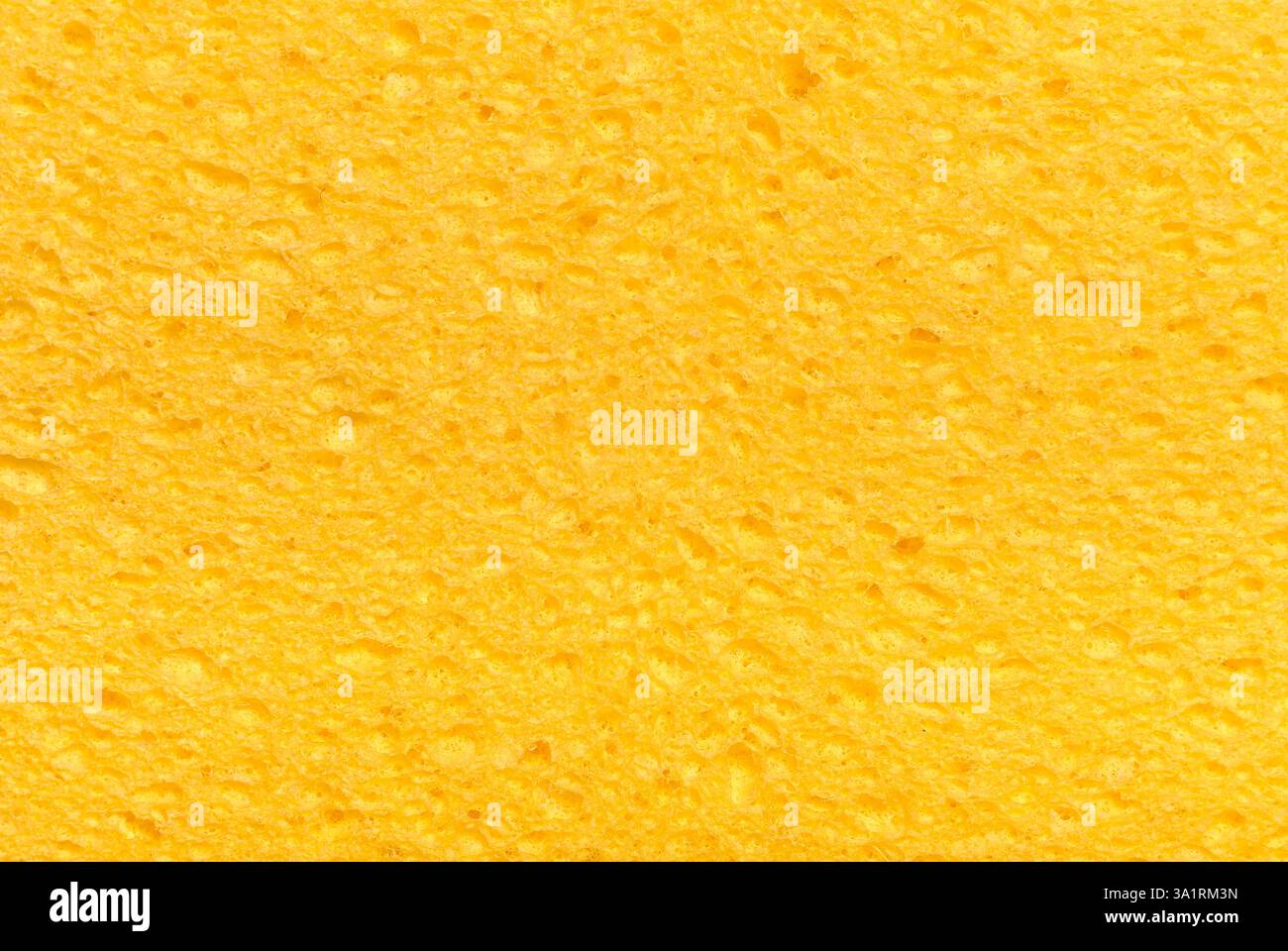elément de conception de fond d'éponge abstraite en mousse poreuse jaune Banque D'Images