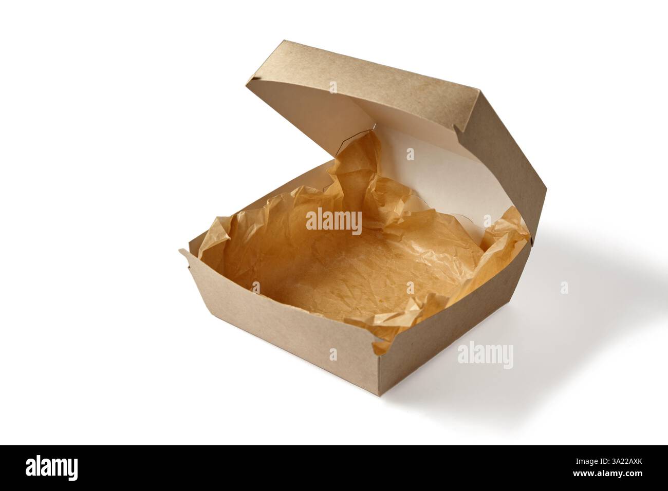 boîte en carton avec papier artisanal pour hamburgers isolé sur fond blanc Banque D'Images boîte en carton avec papier artisanal pour hamburgers isolé sur fond blanc Banque D'Images