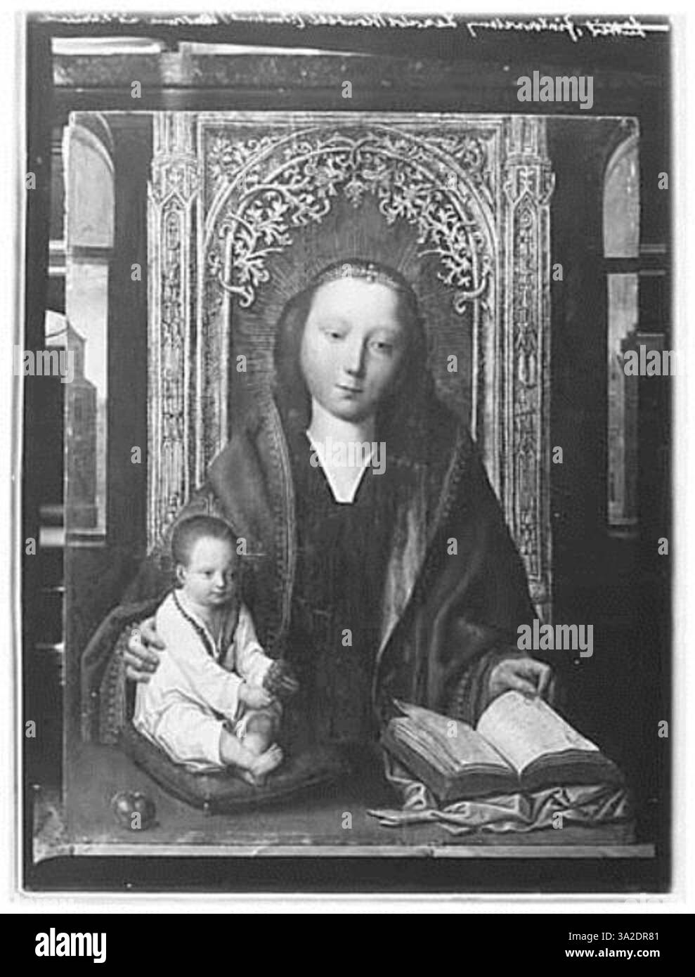 Cette représentation du XVIe siècle de la Vierge à l'enfant, influencée par Quinten Massijs, met en valeur la dévotion religieuse et le style artistique de la Renaissance du Nord dans un portrait tendre de Marie et Jésus. Banque D'Images