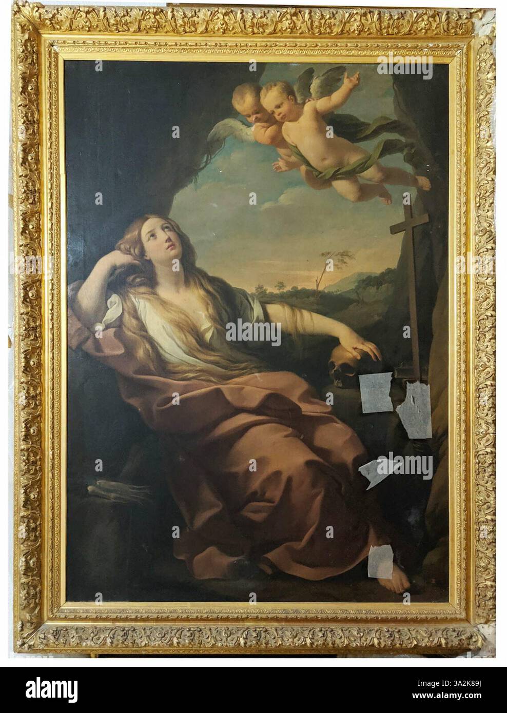 L'interprétation de Guido Reni de Mary Magdalene met en valeur sa profondeur émotionnelle et sa révérence. À l'aide d'un pinceau délicat et d'une palette de couleurs discrète, Reni transmet la réflexion spirituelle du saint. L'œuvre est conservée au Lycée Bossuet à Condom. Banque D'Images