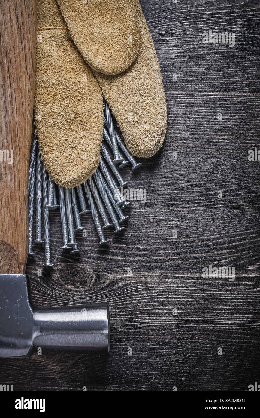 Ensemble de gants de sécurité en cuir construction clous marteau à griffes Banque D'Images