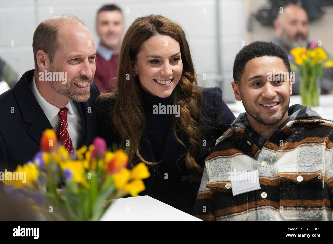 Britain's Prince William, Patron of the Welsh Rugby Union (WRU), and Kate, the Princess of Wales, Patron of the Rugby Football Union (RFU), pose for a photo with Leif Thobroe as they meet injured players who are supported by the Welsh Rugby Charitable Trust before attending the Wales versus England Six Nations match at the Principality Stadium in Cardiff, Saturday, March 15, 2025.(AP Photo/Alastair Grant, Pool) Banque D'Images