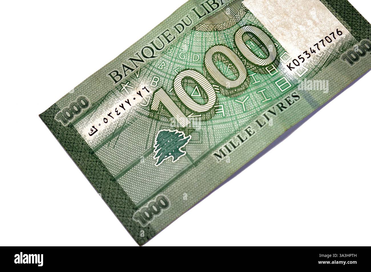 Le verso de 1000 livres mille livres libanaises billets de banque en espèces, dispose de disque de lettres latines et phéniciennes, de cèdre et de l Banque D'Images Le verso de 1000 livres mille livres libanaises billets de banque en espèces, dispose de disque de lettres latines et phéniciennes, de cèdre et de l Banque D'Images