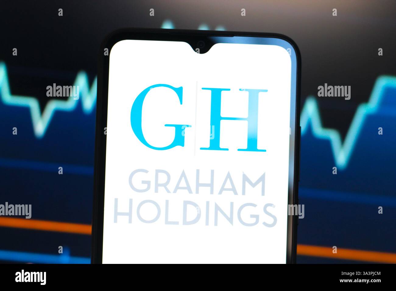 Canada. 17 mars 2025. Dans cette illustration photo, le logo Graham Holdings Company (GH) est affiché sur l'écran d'un smartphone. (Photo de Thomas Fuller/SOPA images/SIPA USA) *** strictement à des fins éditoriales *** crédit : SIPA USA/Alamy Live News Banque D'Images