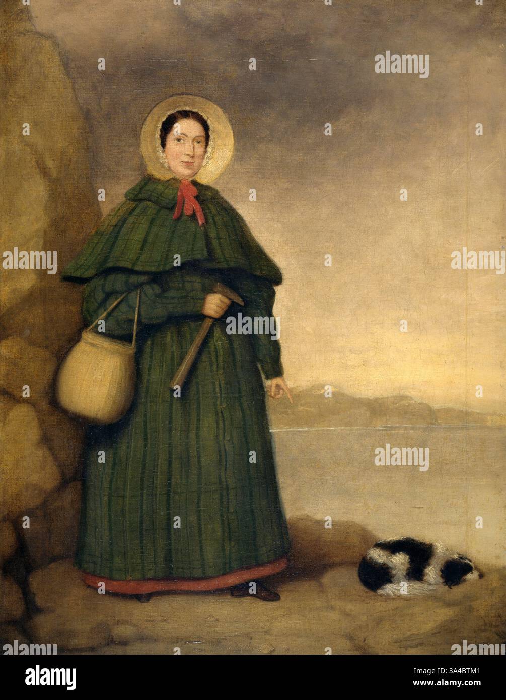 Mary Anning avec son chien Tray. Mary Anning (1799–1847) est une collectionneuse, marchand et paléontologue anglaise. Elle est devenue connue internationalement pour ses découvertes dans les lits fossiles marins jurassiques dans les falaises le long de la Manche à Lyme Regis dans le comté de Dorset, au sud-ouest de l'Angleterre. Les découvertes d'Anning ont contribué à des changements dans la pensée scientifique sur la vie préhistorique et l'histoire de la Terre. Ses découvertes comprennent le premier squelette d'ichtyosaure correctement identifié à l'âge de douze ans ; les deux premiers squelettes de plésiosaure presque complets ; le premier squelette de ptérosaure Banque D'Images