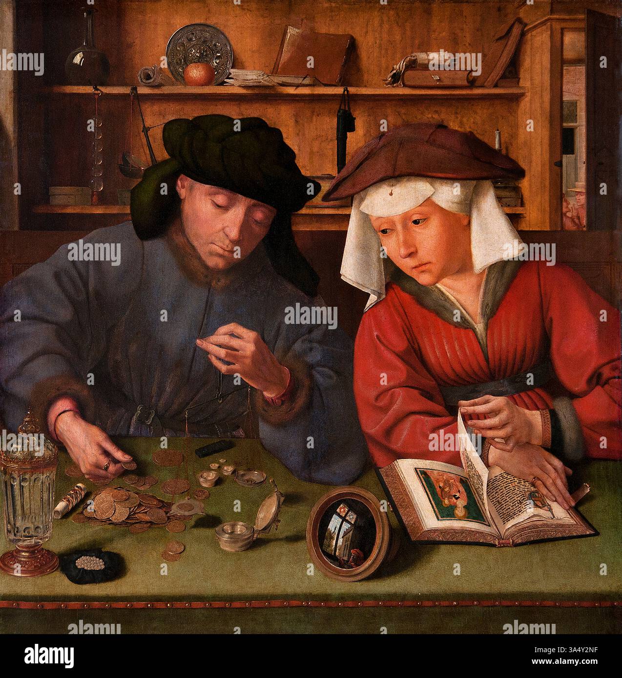 Le changeur d'argent et sa femme -- METSYS Quentin 1466-1530 belge flamand, Louvre France Musée des Beaux-Arts Paris. Banque D'Images