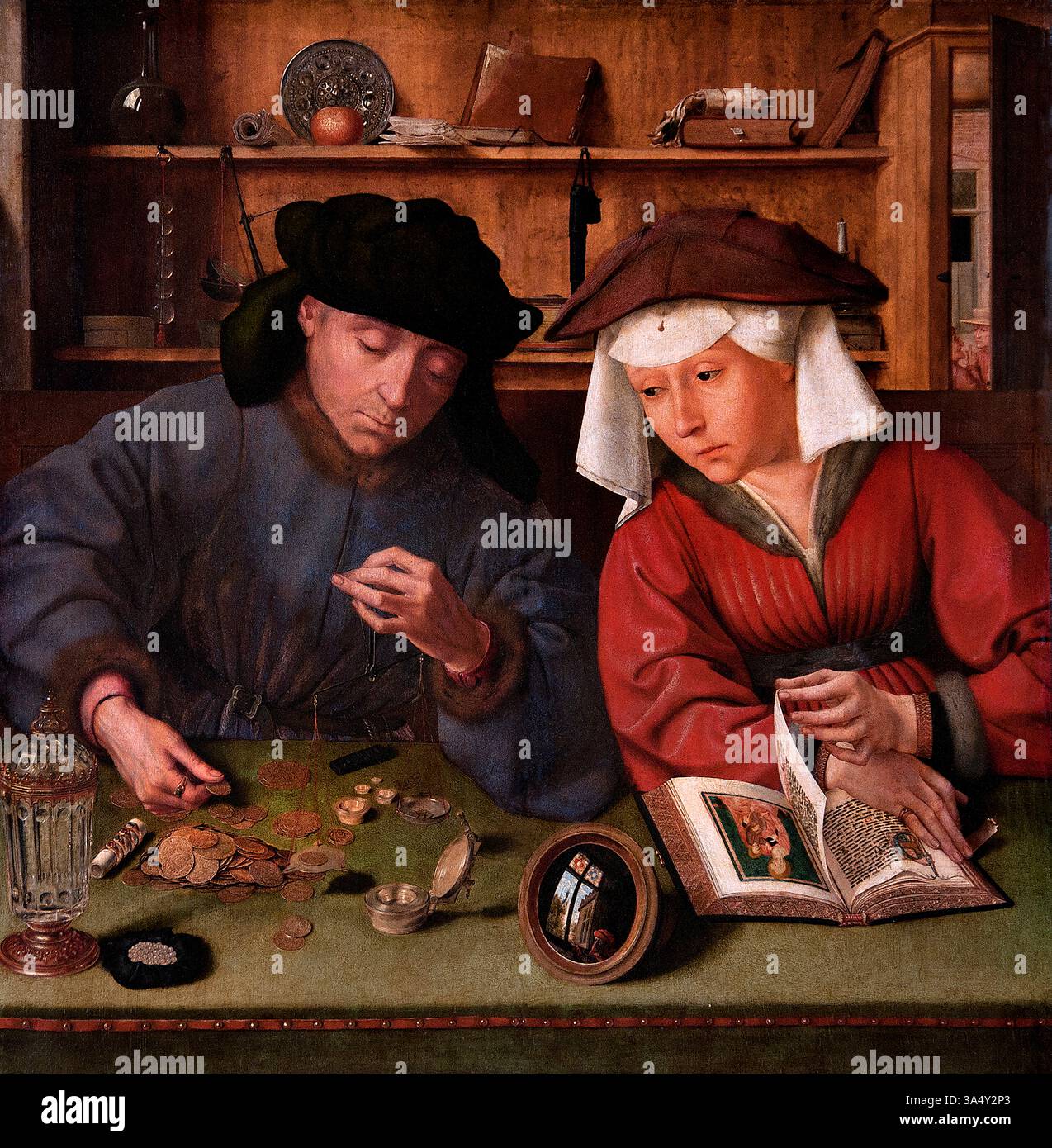 Le changeur d'argent et sa femme -- METSYS Quentin 1466-1530 belge flamand, Louvre France Musée des Beaux-Arts Paris. Banque D'Images