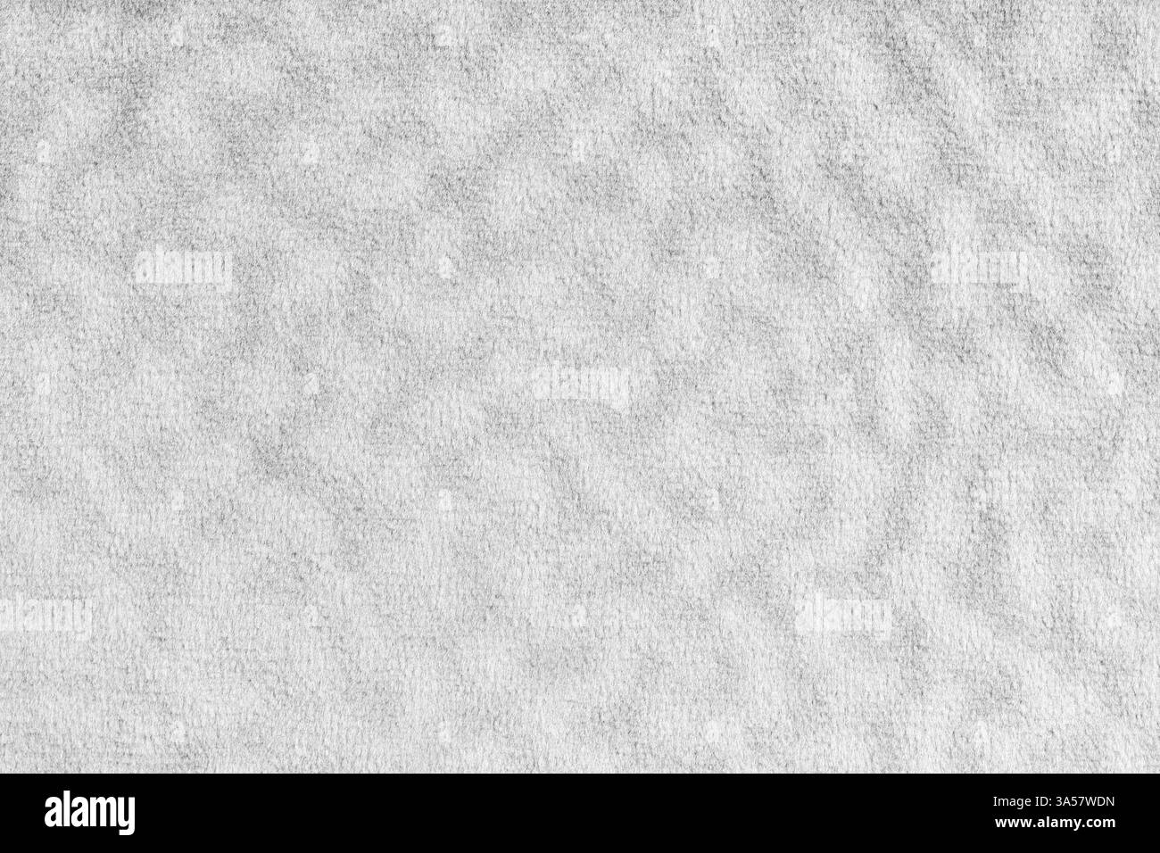 Fausse fourrure, tissu blanc velours ou tissu à effet ondulé. Tissu moelleux de texture textile de fourrure artificielle macro. Fond de canevas. Decorativ Banque D'Images