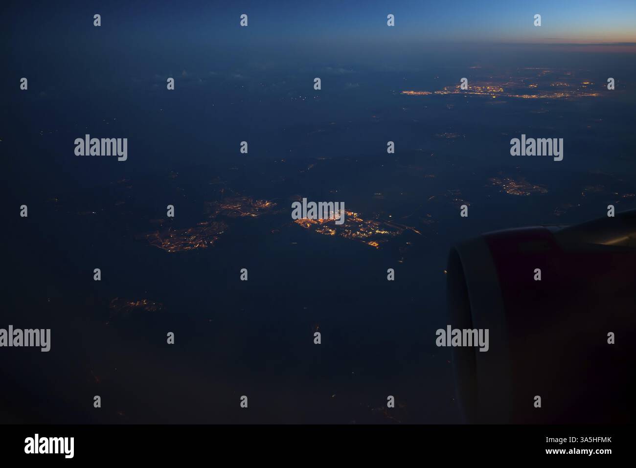 Vue de nuit en dehors de la fenêtre de l'avion Banque D'Images