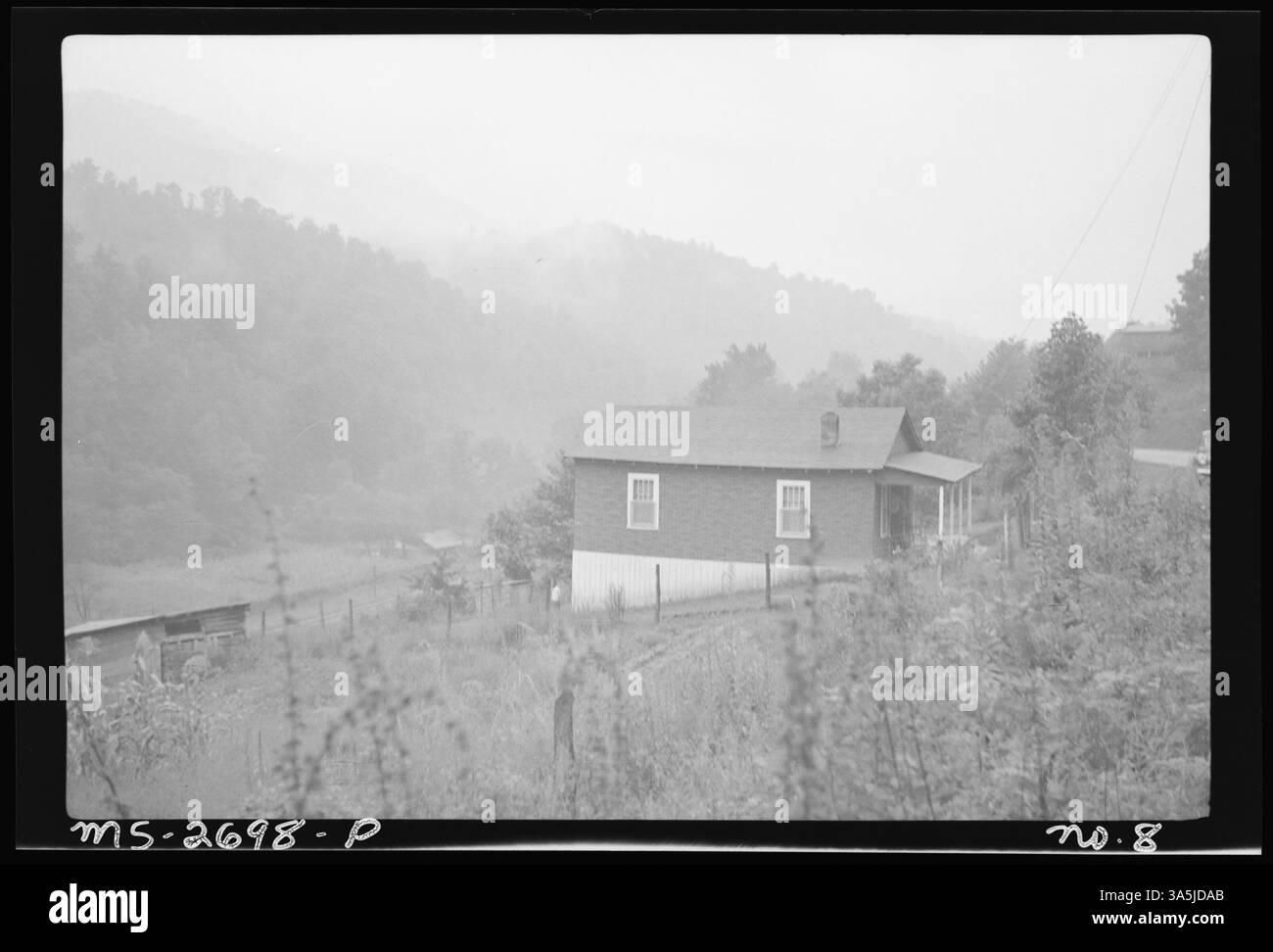 Une maison appartenant à un mineur (#6) à la mine Darby de Peerless Darby Coal Company à Splint, comté de Harlan, Kentucky, montrant la vie résidentielle dans la communauté minière. Banque D'Images