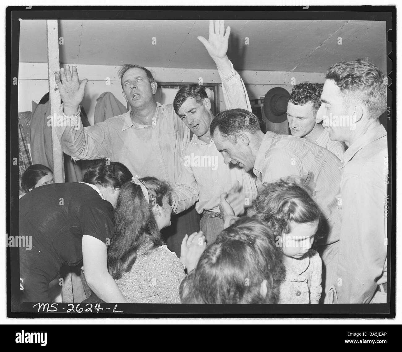 Une cérémonie de guérison de l'imposition des mains a eu lieu dans l'Église pentecôtiste de Dieu à Lejunior, comté de Harlan, Kentucky, dans le cadre des pratiques religieuses dans la communauté. Banque D'Images
