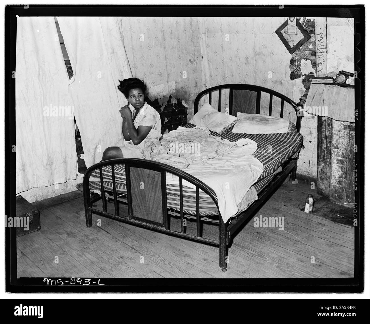 La chambre d'Eddie Cain, un mineur vivant dans un logement d'entreprise près de la mine porter à Adamsville, en Alabama, fait partie d'un projet de logement par Adams, Rowe & Norman Inc Banque D'Images